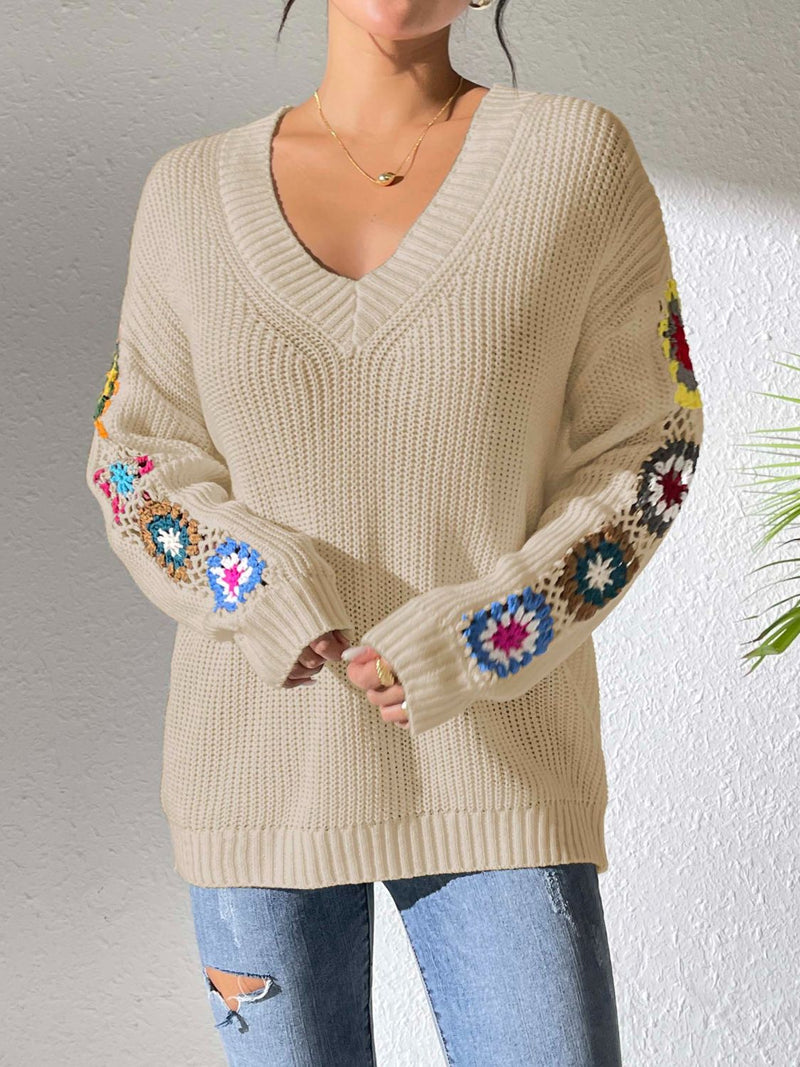 Pull au design réfléchi