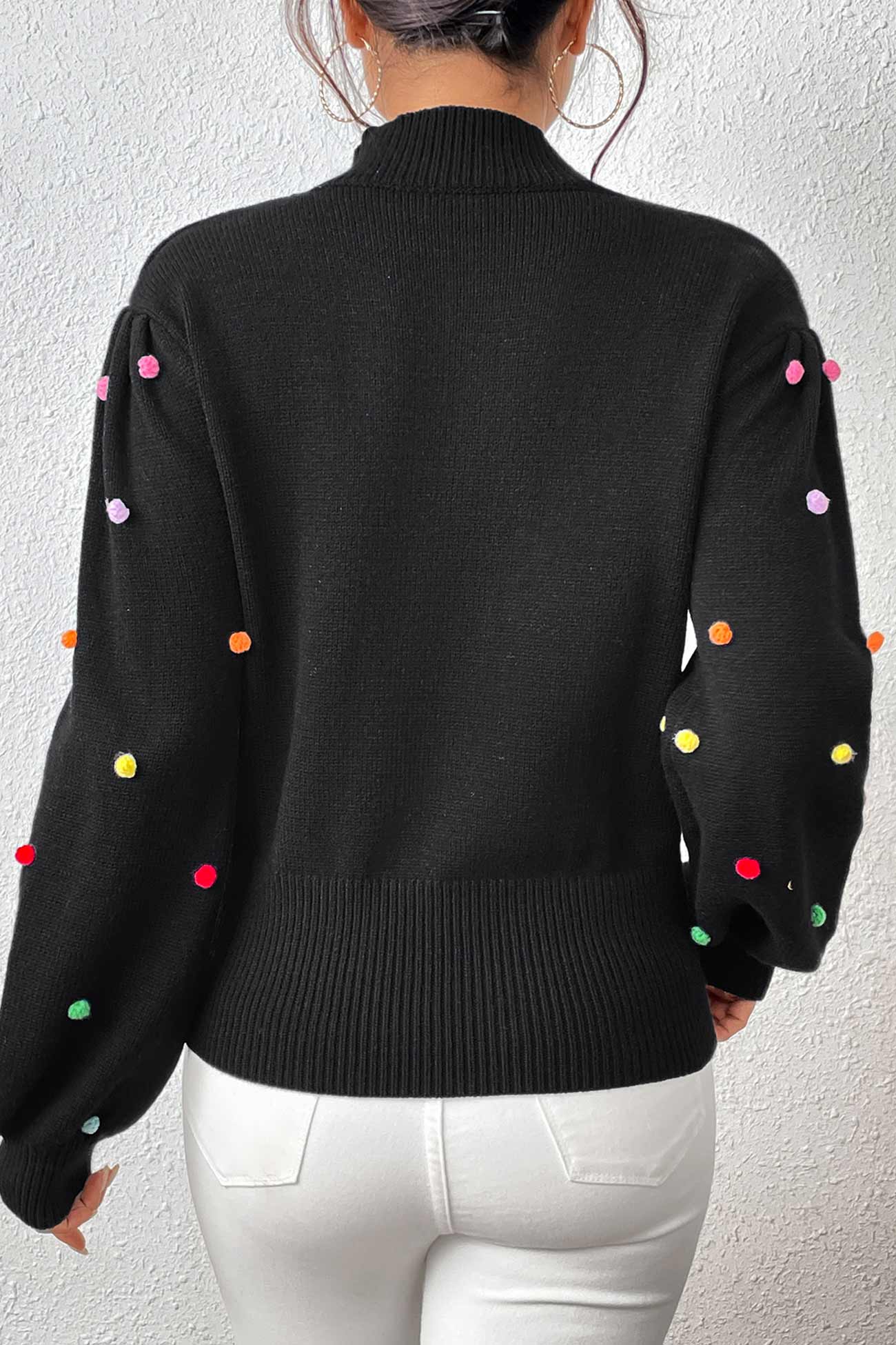 Pull au design réfléchi