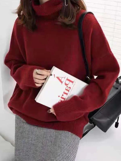 Pull à col roulé mélange cachemire à silhouette minimaliste, coloris taupe