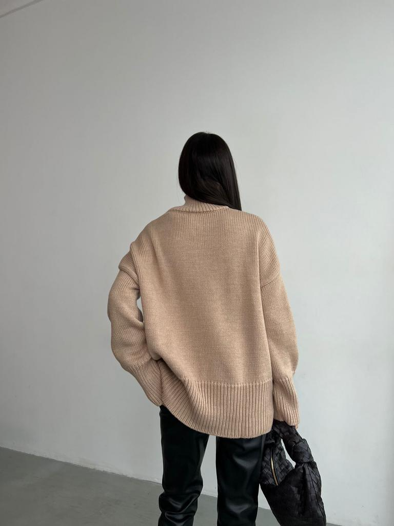 Pull au design réfléchi