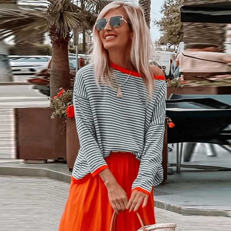 EP | Pull à rayures bleues et bordure orange