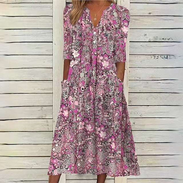 SL | robe florale avec décolleté en V et poches latérales