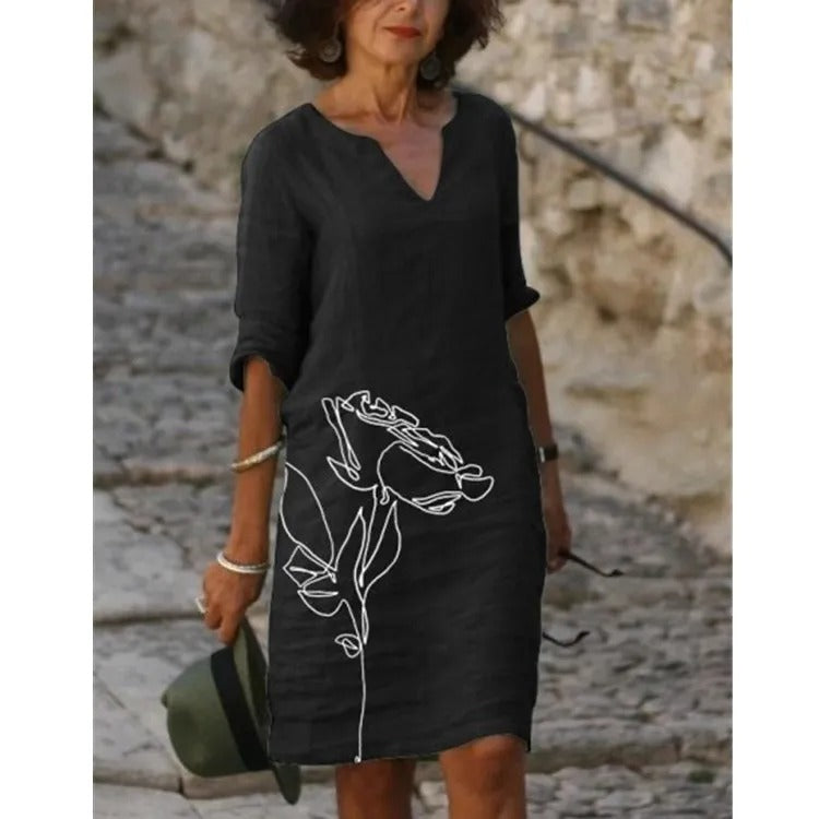 SL | Robe midi avec décolleté en V et imprimé fleuri