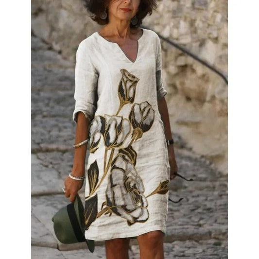 SL | Robe midi avec décolleté en V et imprimé fleuri