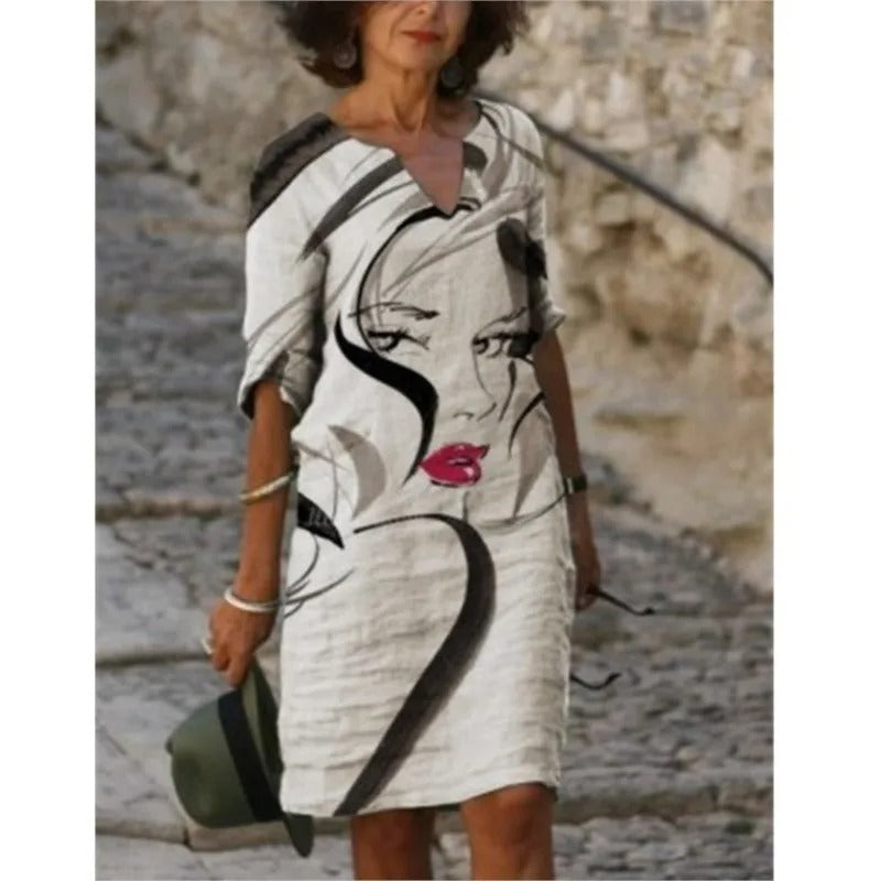 SL | Robe midi avec décolleté en V et imprimé fleuri