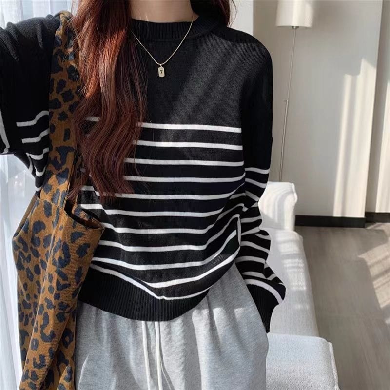 EP | Pull-over solide à col rond