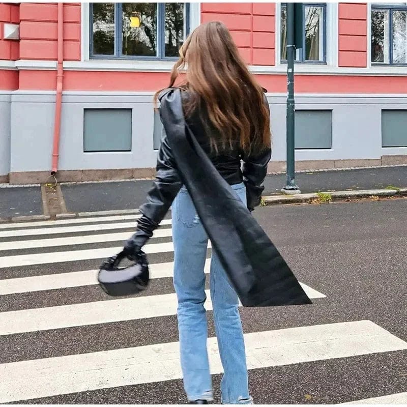 EP | Veste ample sans manches avec un élégant col rond en tricot uni