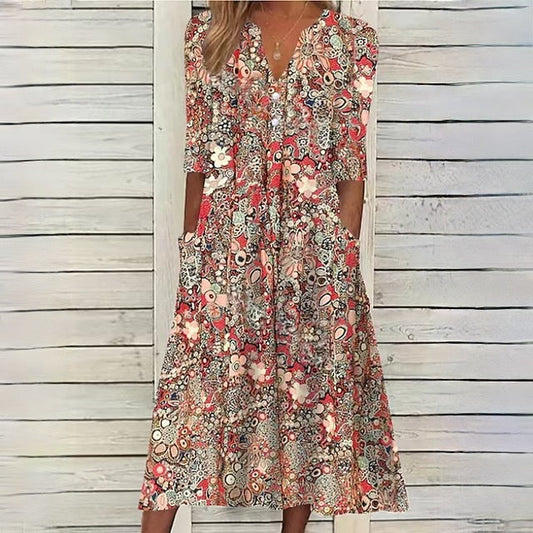 SL | robe florale avec décolleté en V et poches latérales